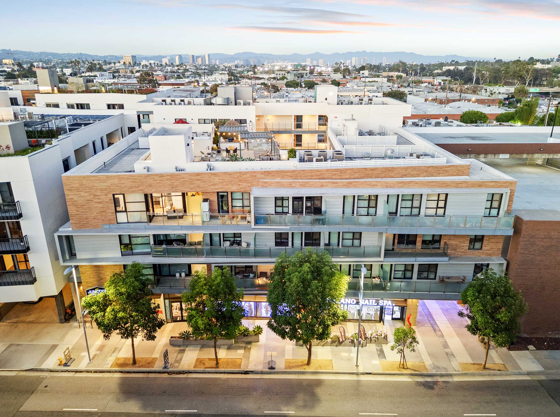 Junction Santa Monica aerial building exterior at sunset