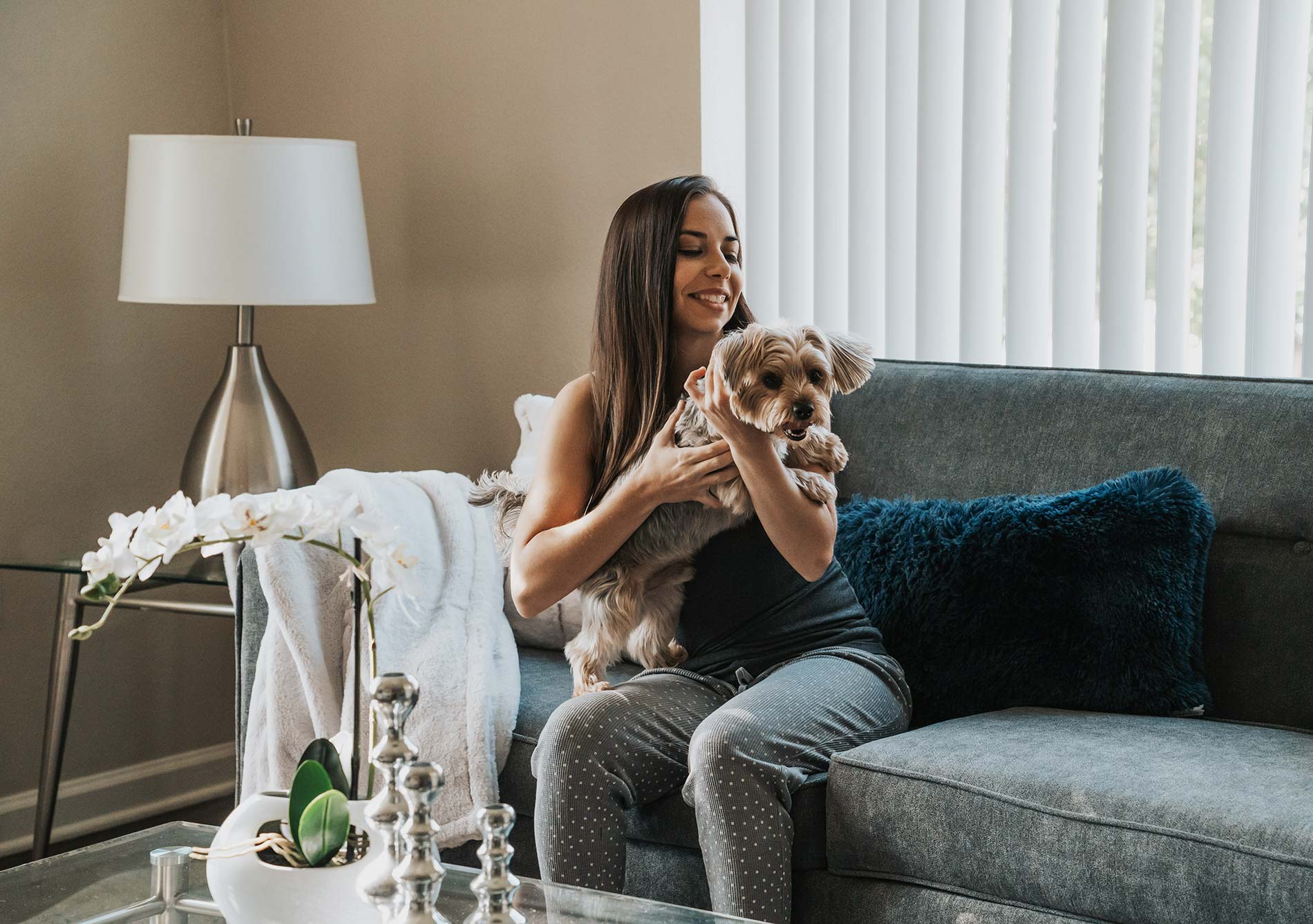 Almaden Lake woman with dog on couch