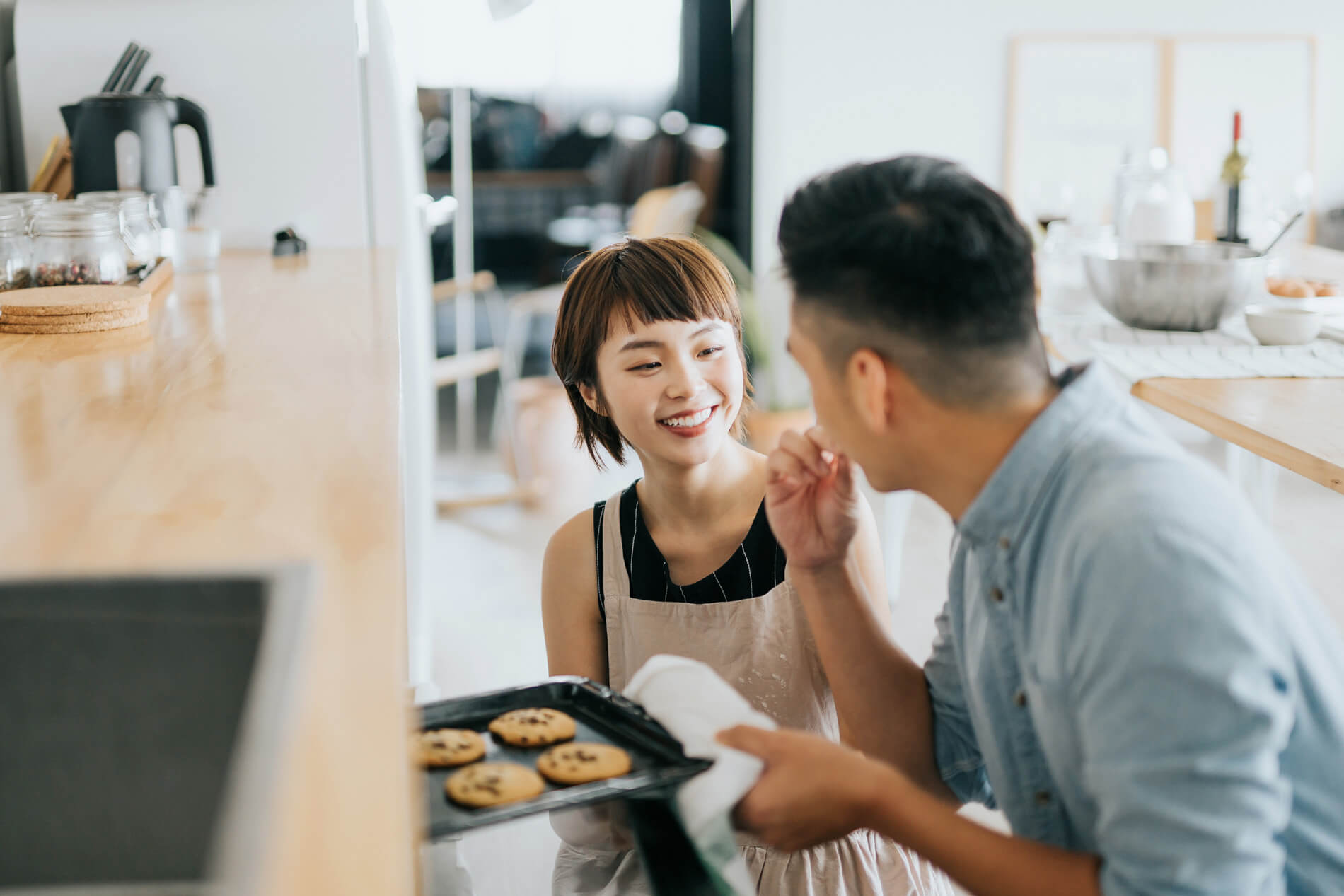 Couple baking cookies