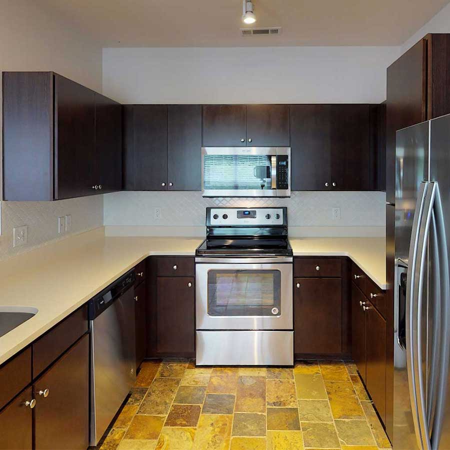 Lodge at Ames Pond apartment kitchen walnut on sand finish package