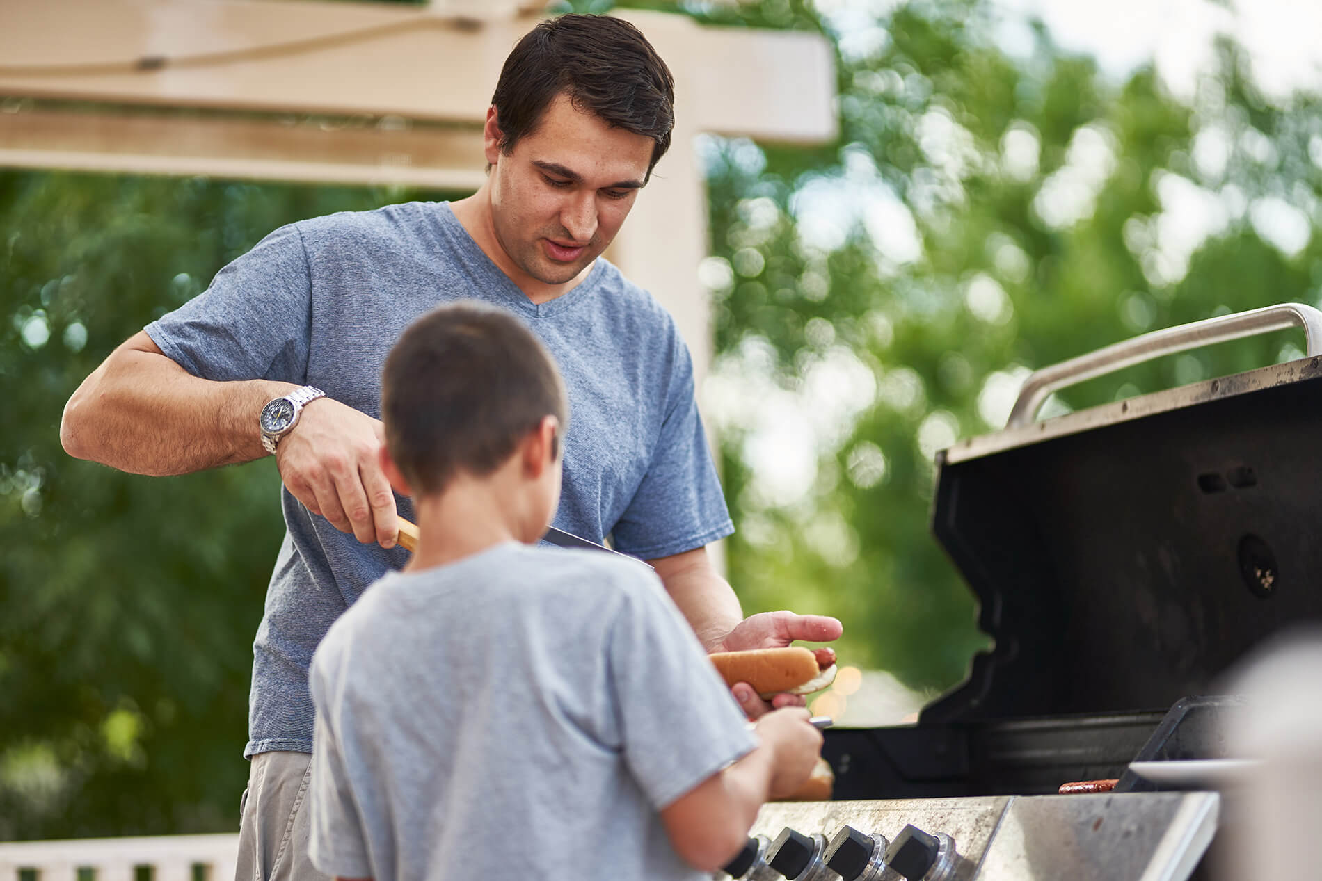 People grilling outside