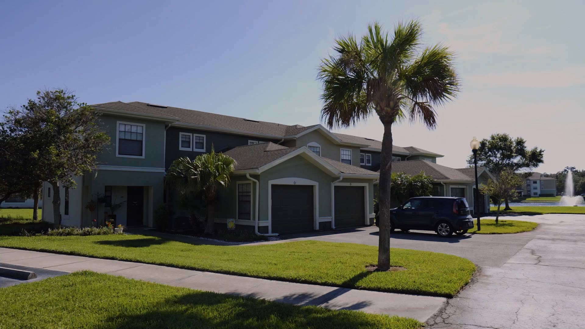 MacAlpine Place building exterior with garage