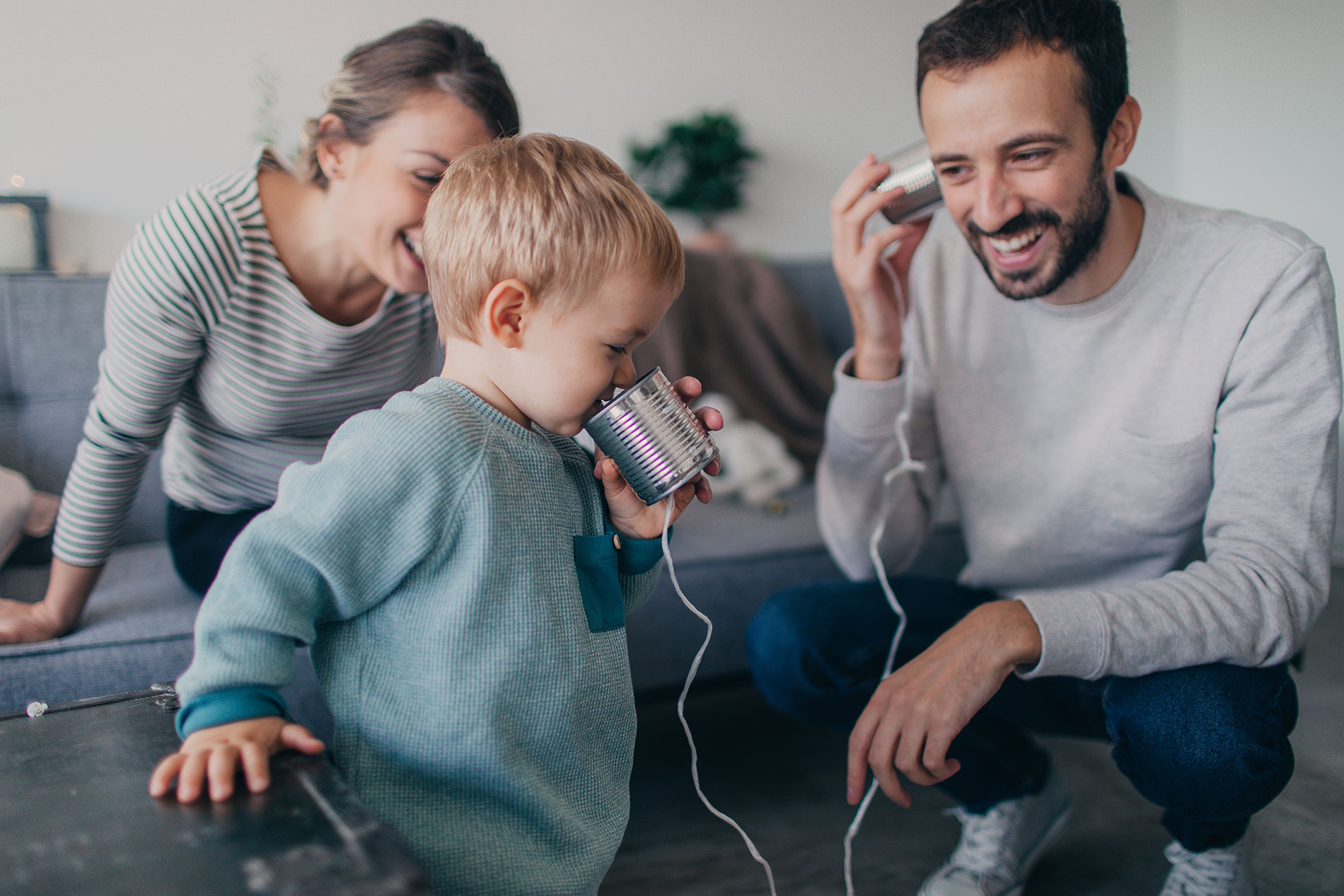 Family in living room with small child