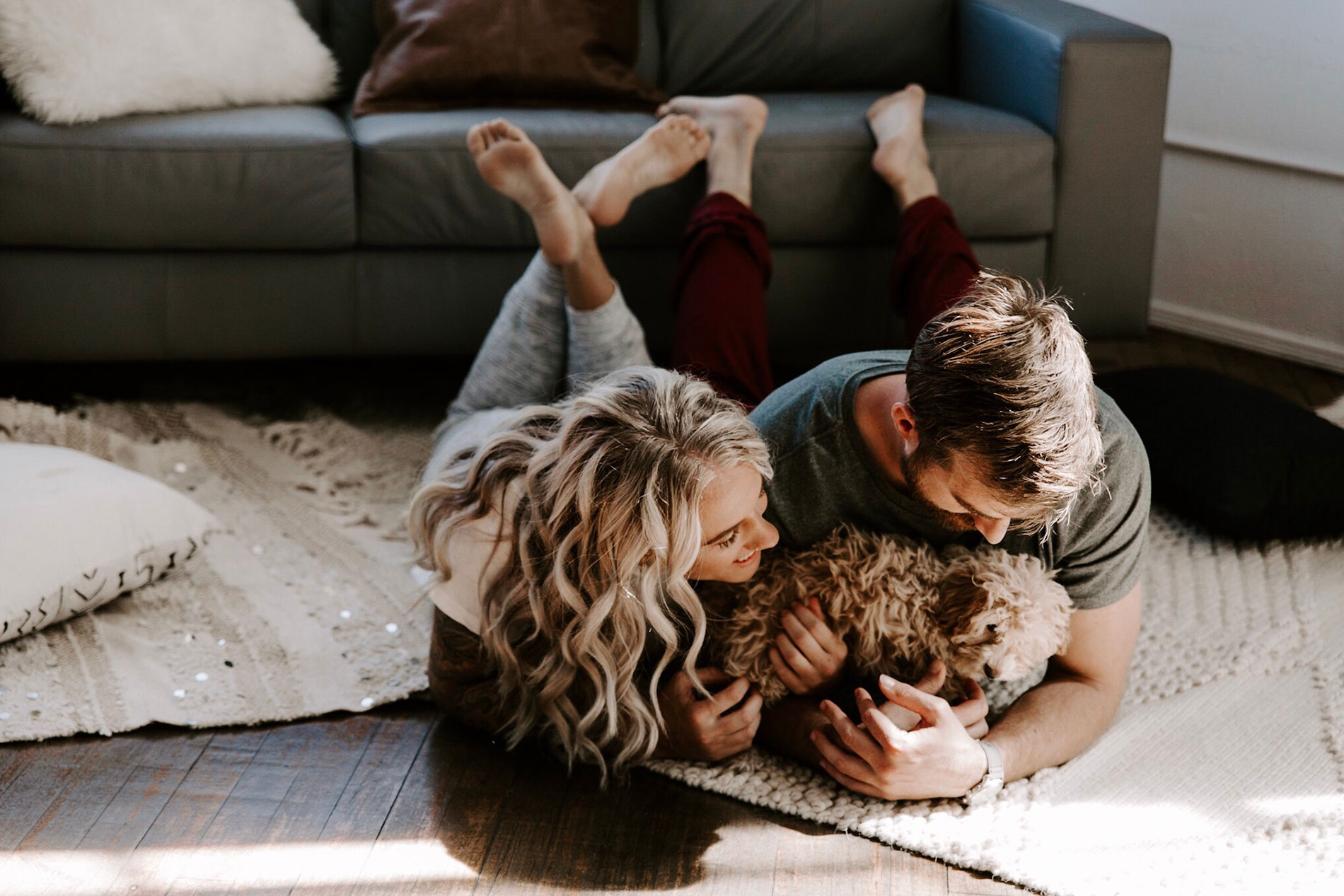 Lifestyle young couple with dog