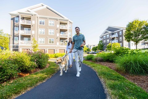 One Upland couple walks dog outside property