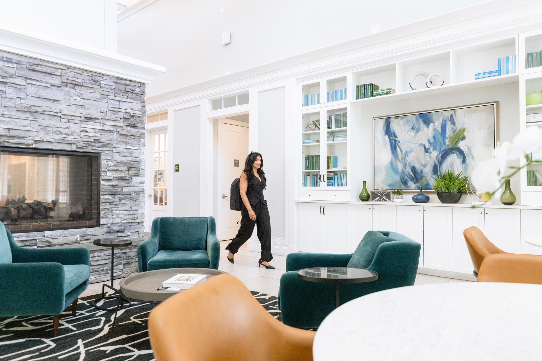 One Upland woman walks through clubhouse