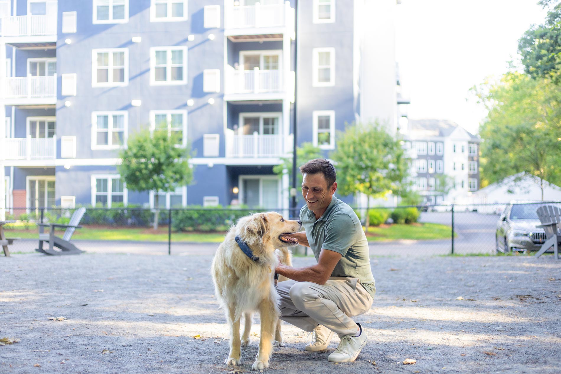 One Upland man with dog in dog park