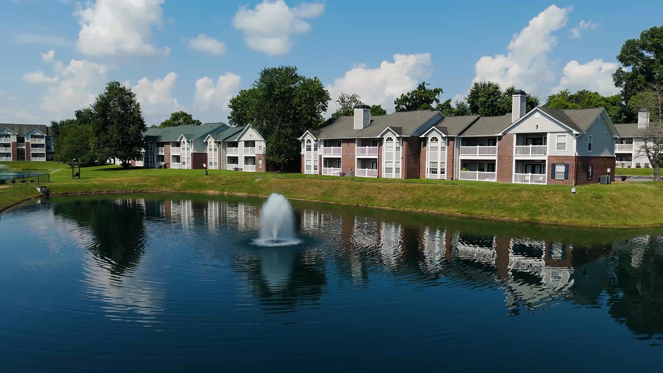 Polo Park building exterior and pond with fountain