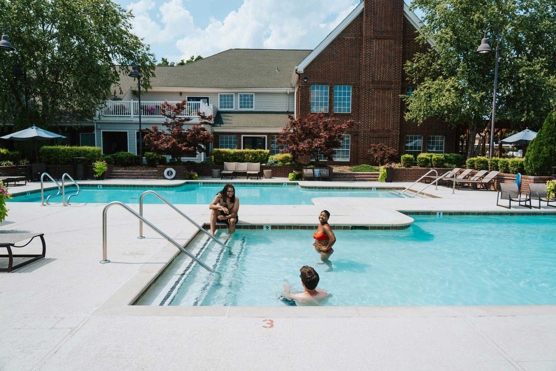 Polo Park three people in the pool