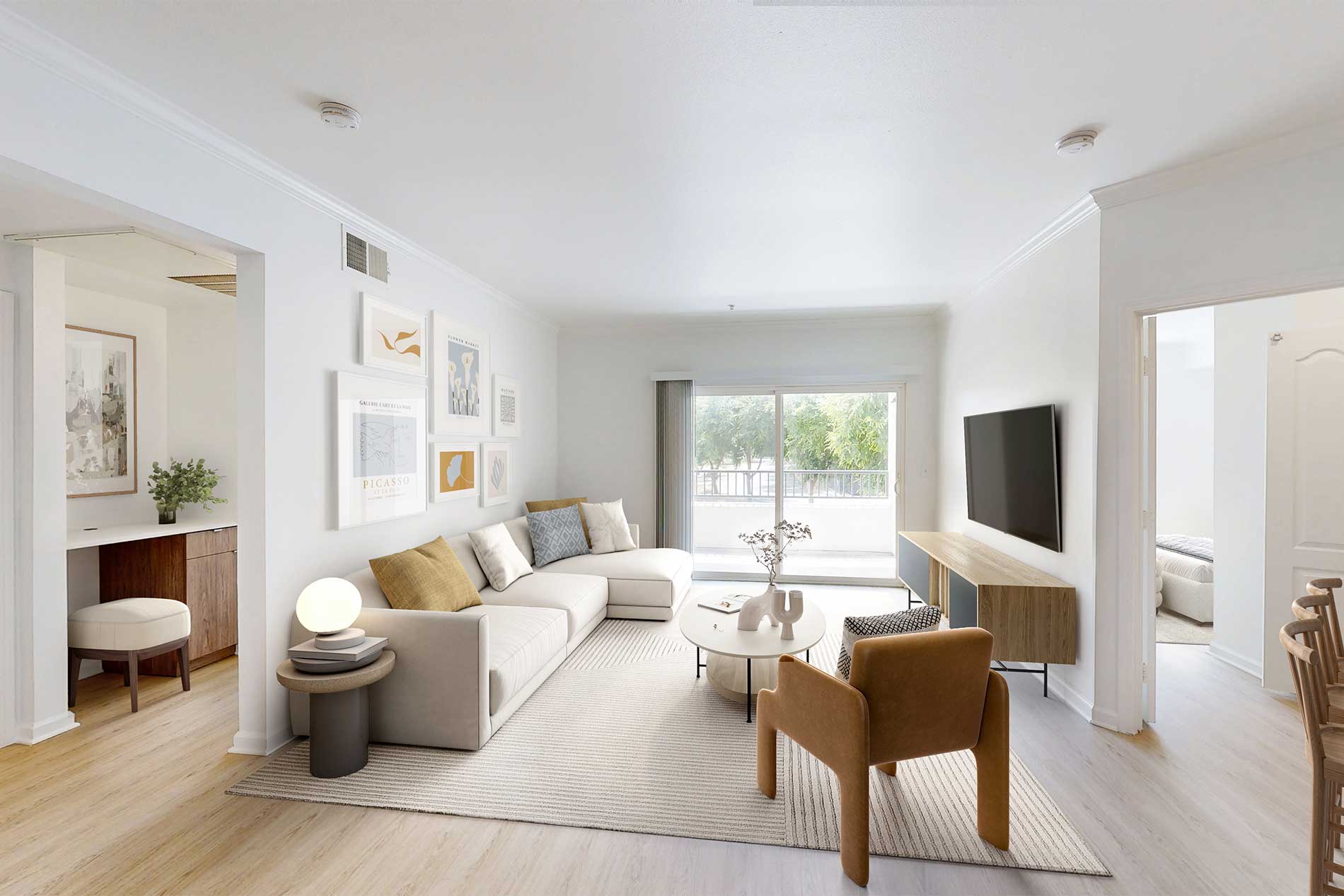 Bright open-concept living room at River Terrace apartments in Santa Clara.