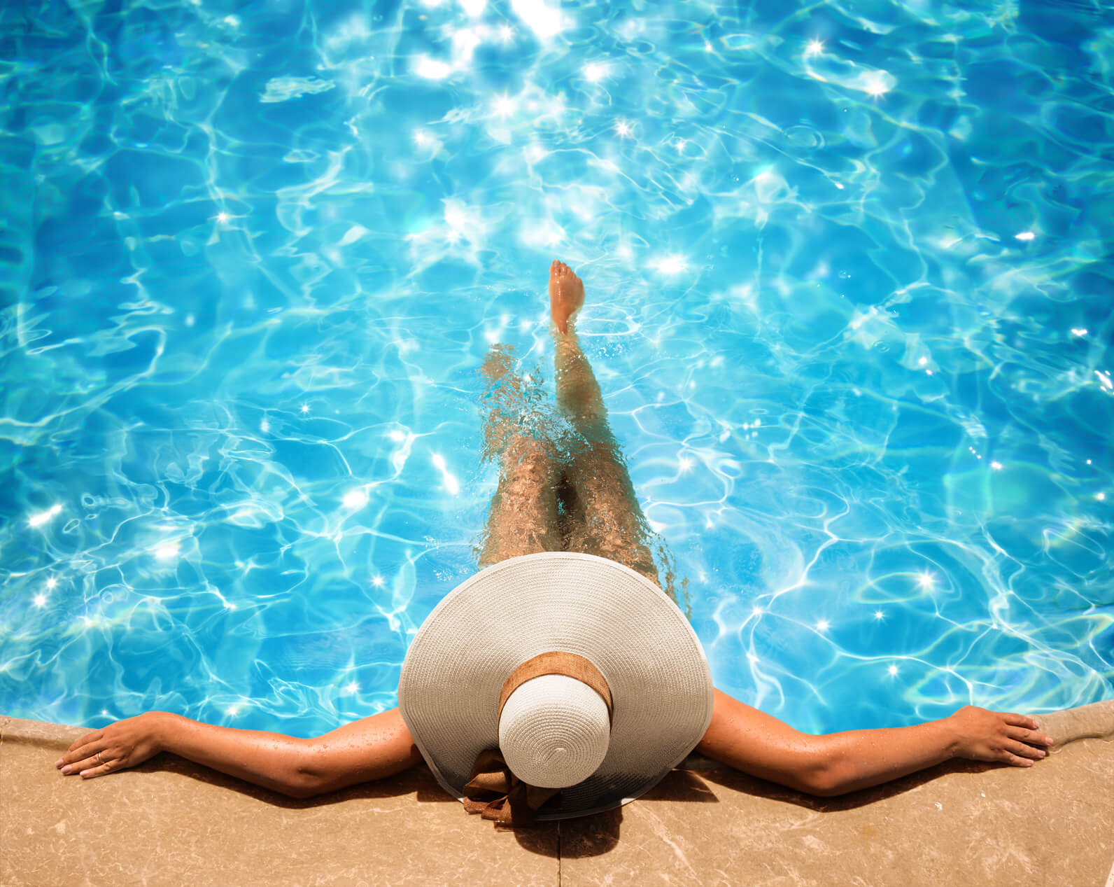 Woman lounging in the pool