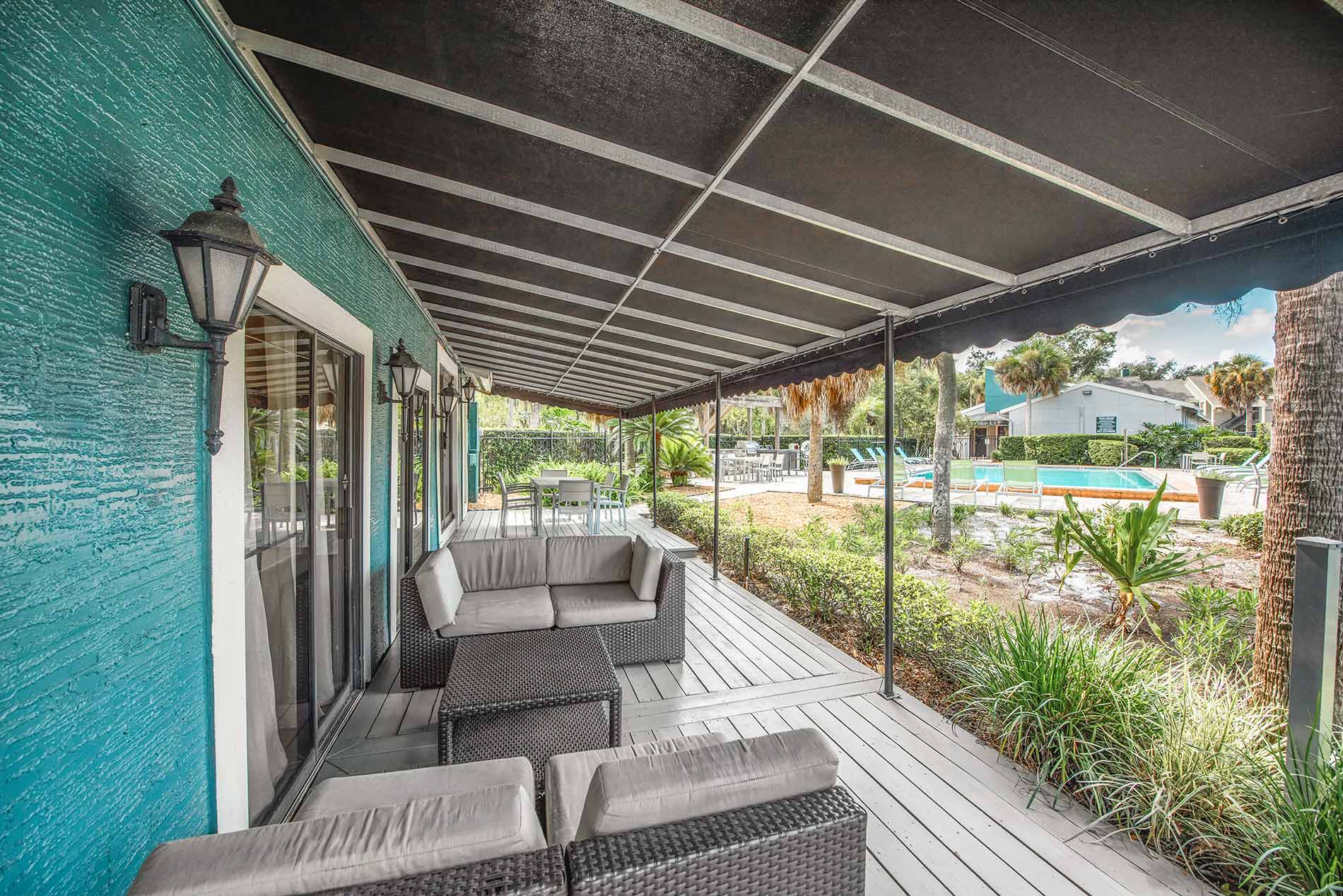 Seville on the Green pool and covered seating area