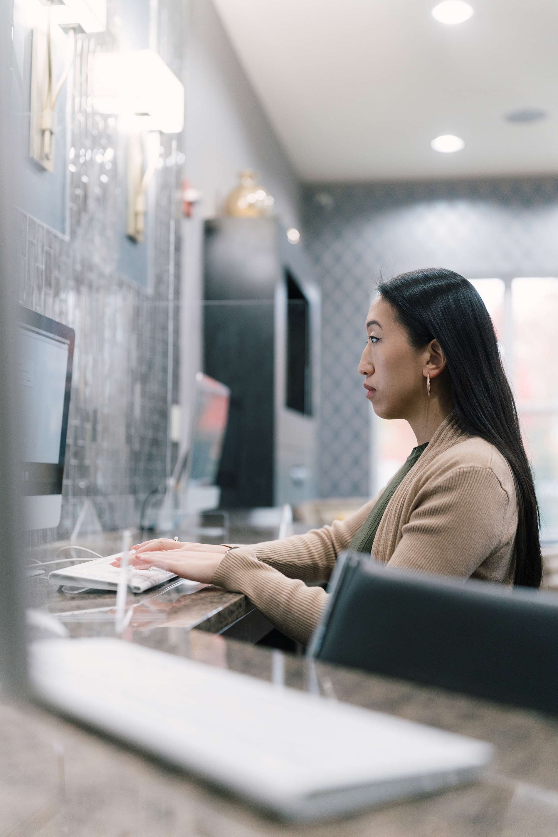 Signal Hill woman works in business center