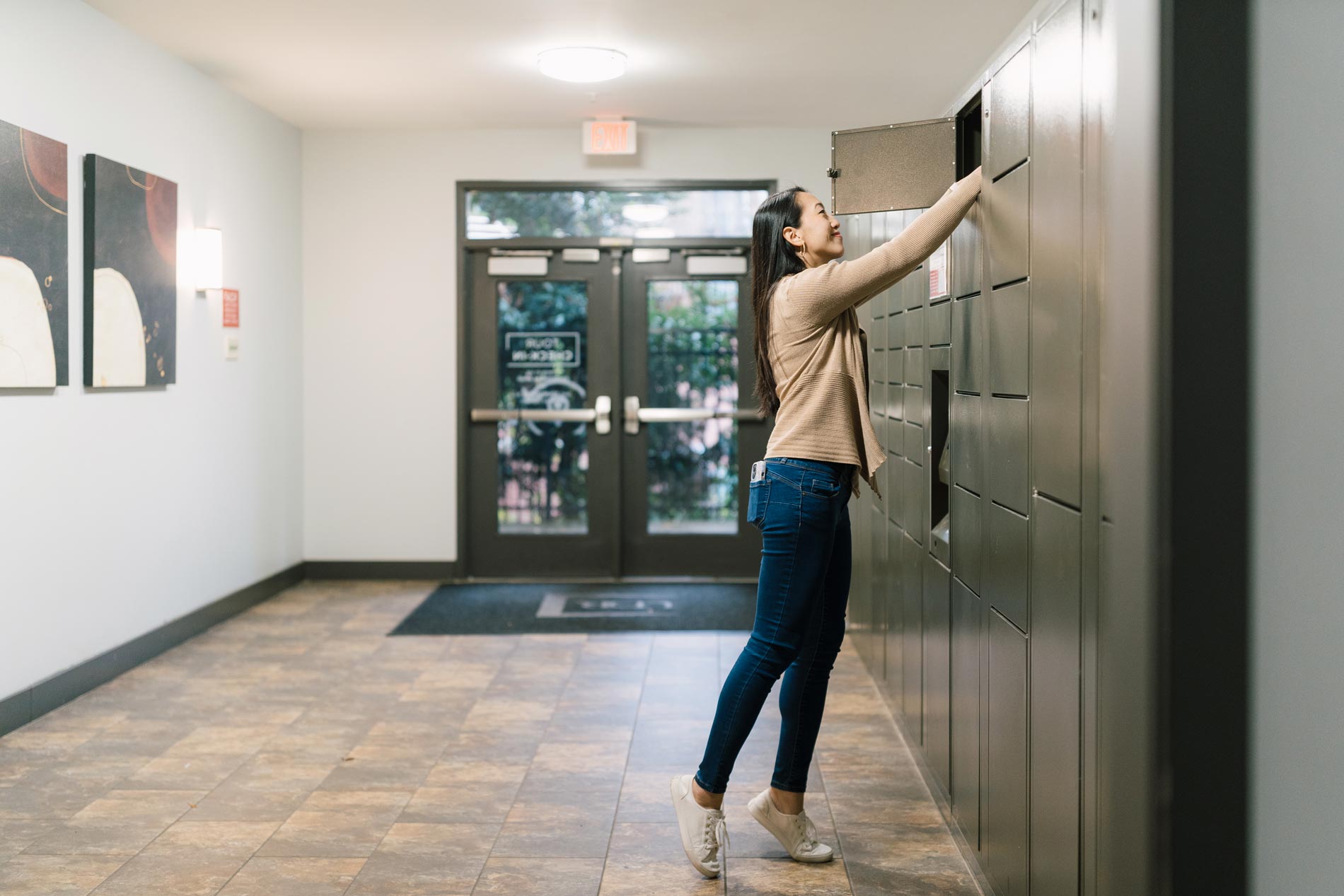 Signal Hill woman grabs package from package lockers