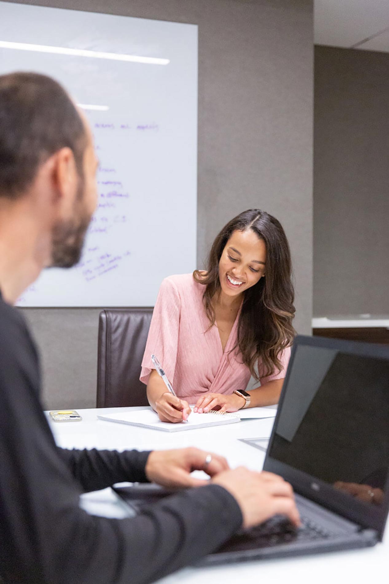 People working in the conference room