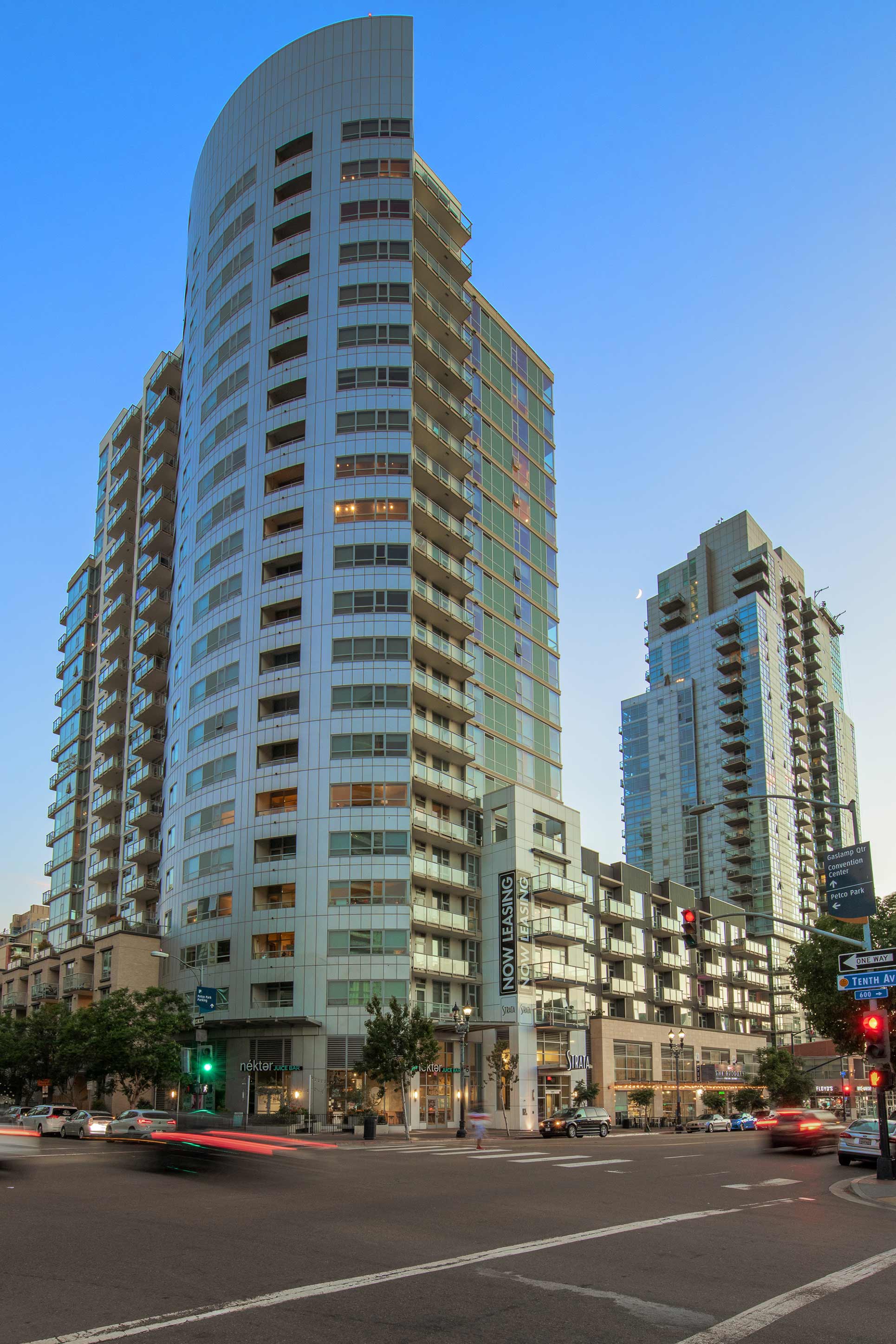 Strata building exterior at sunset