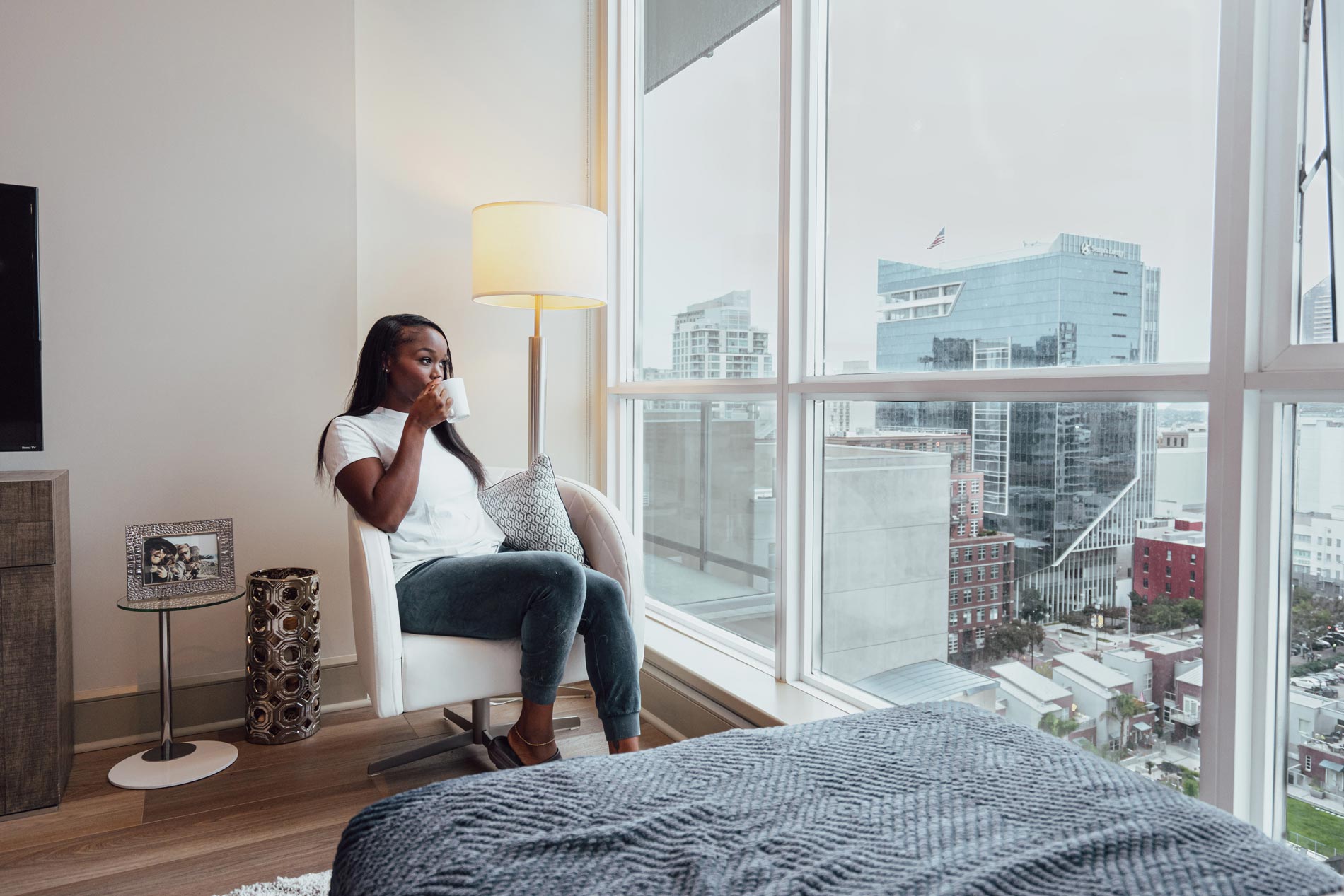 Strata woman in staged living room