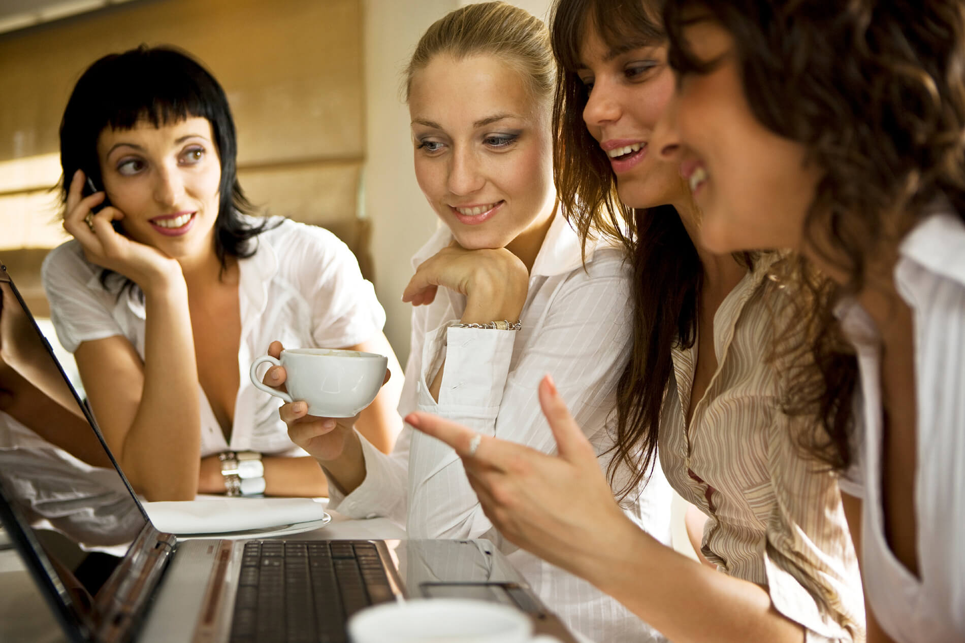 Friends talking over coffee