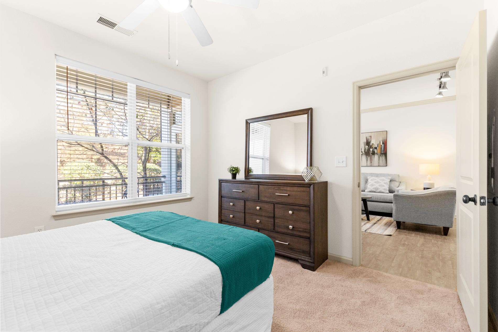 The Enclave staged unit bedroom