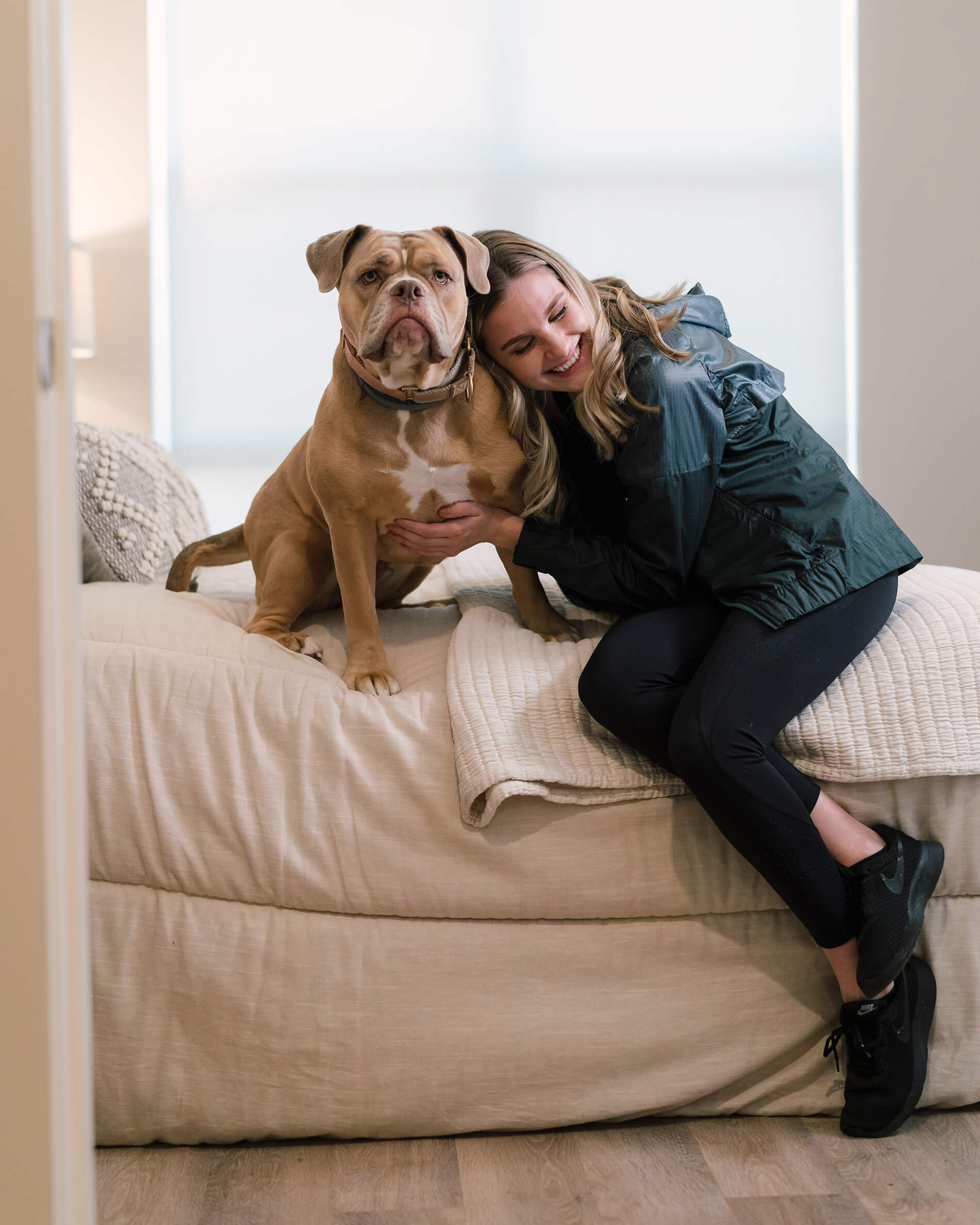 The George Woman With Dog on Bed