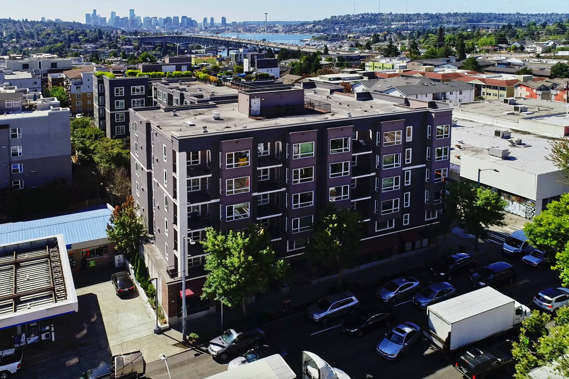 The Kennedy Aerial Building Exterior with Seattle Skyline in Background