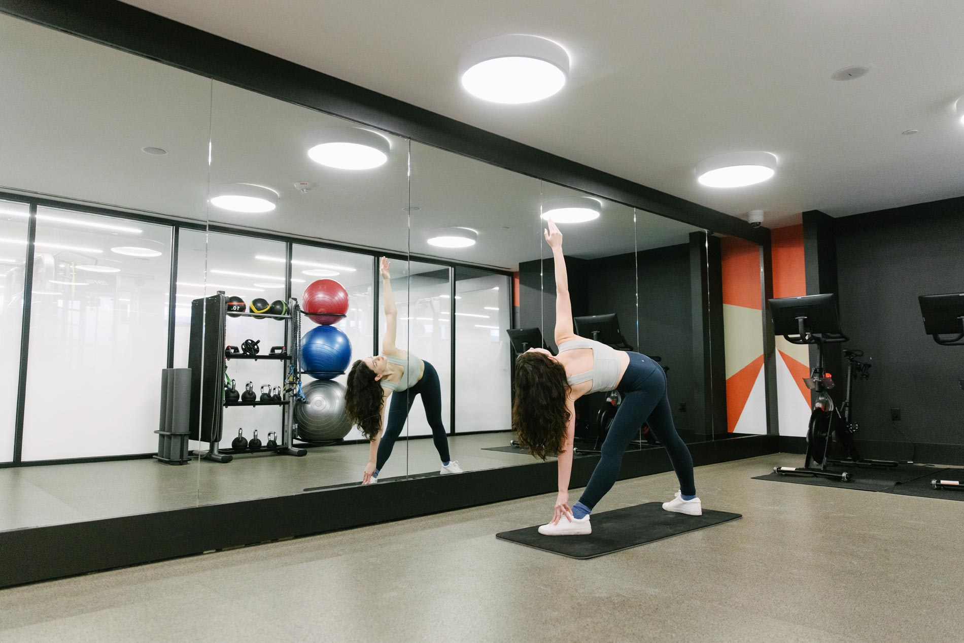 The MO woman exercises in fitness center