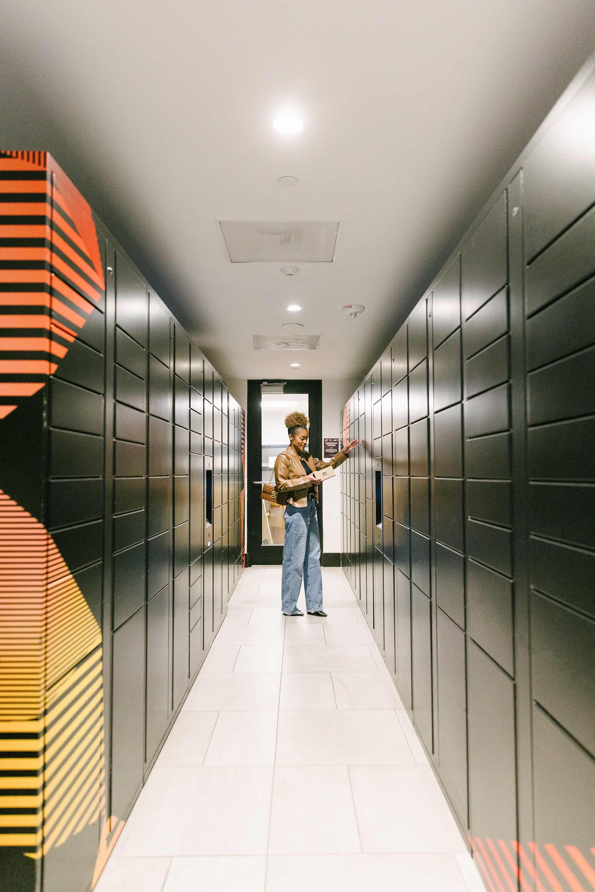 The MO woman gets package in package locker room