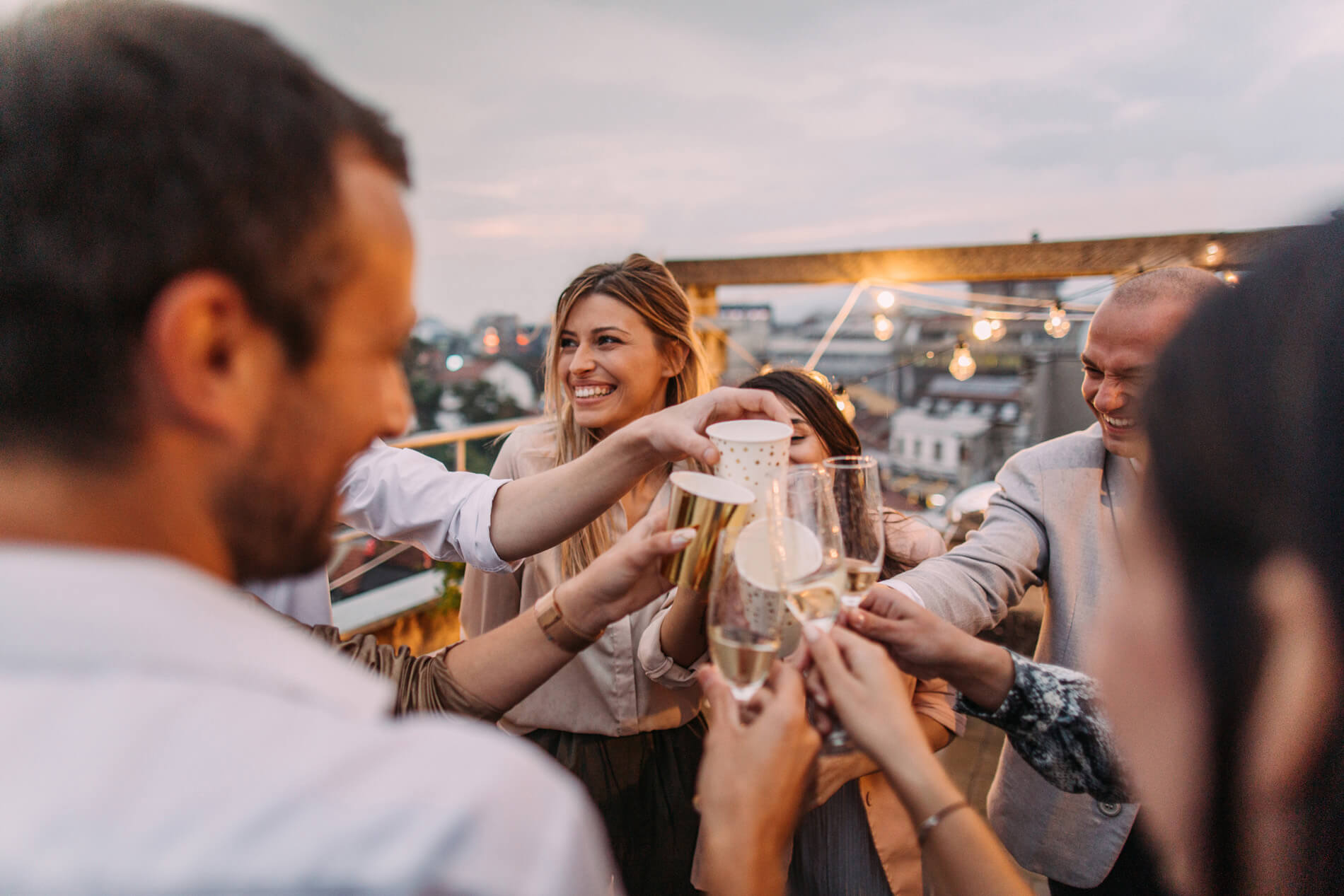 Friends celebrating on the rooftop