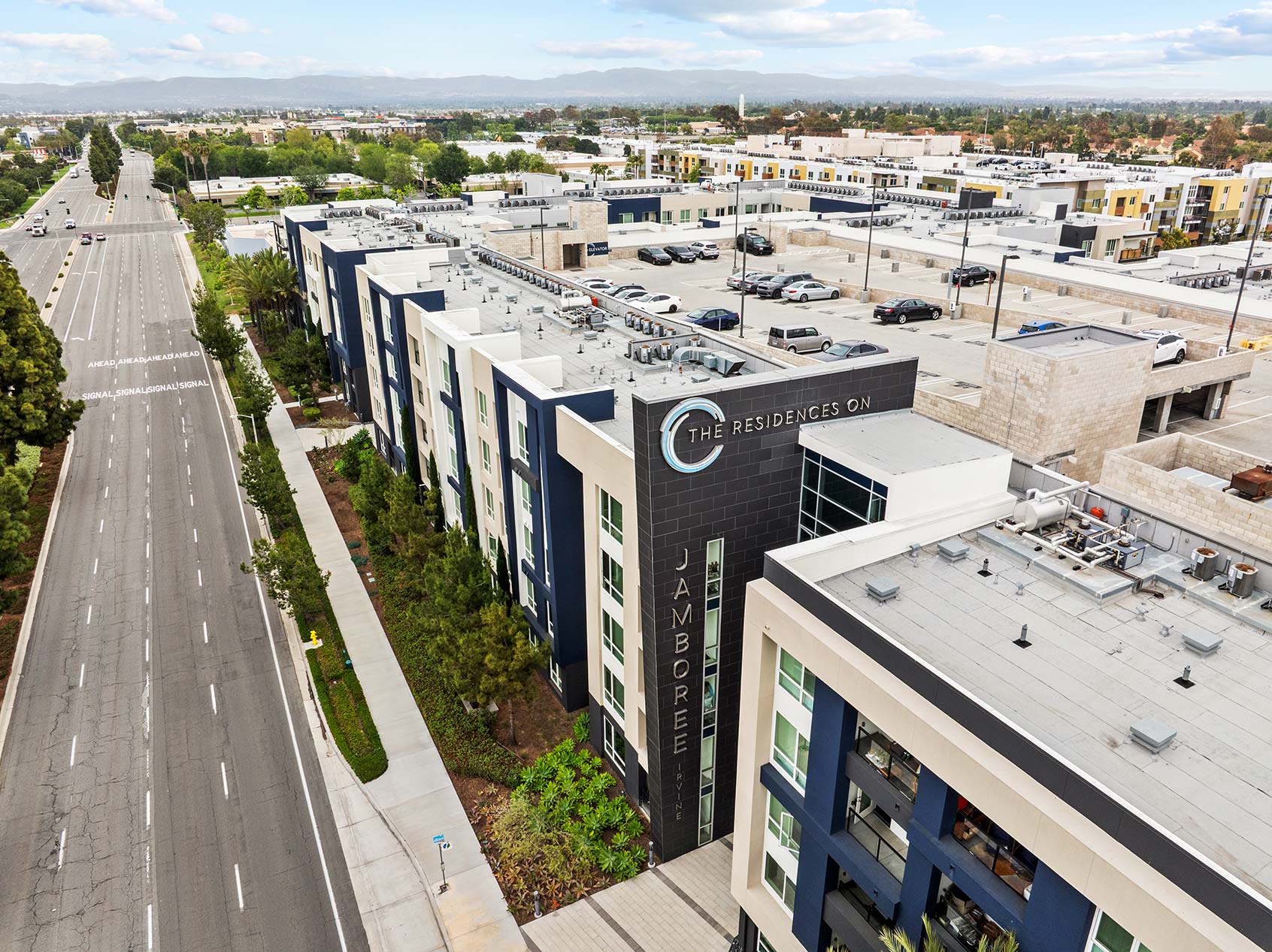 Residences At Jamboree drone building exterior