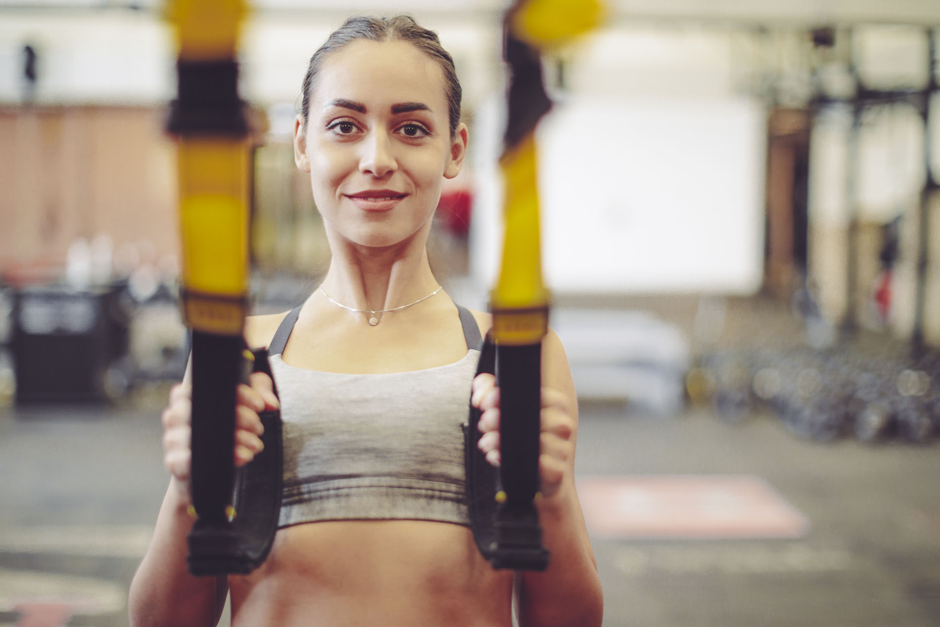 Woman doing TRX