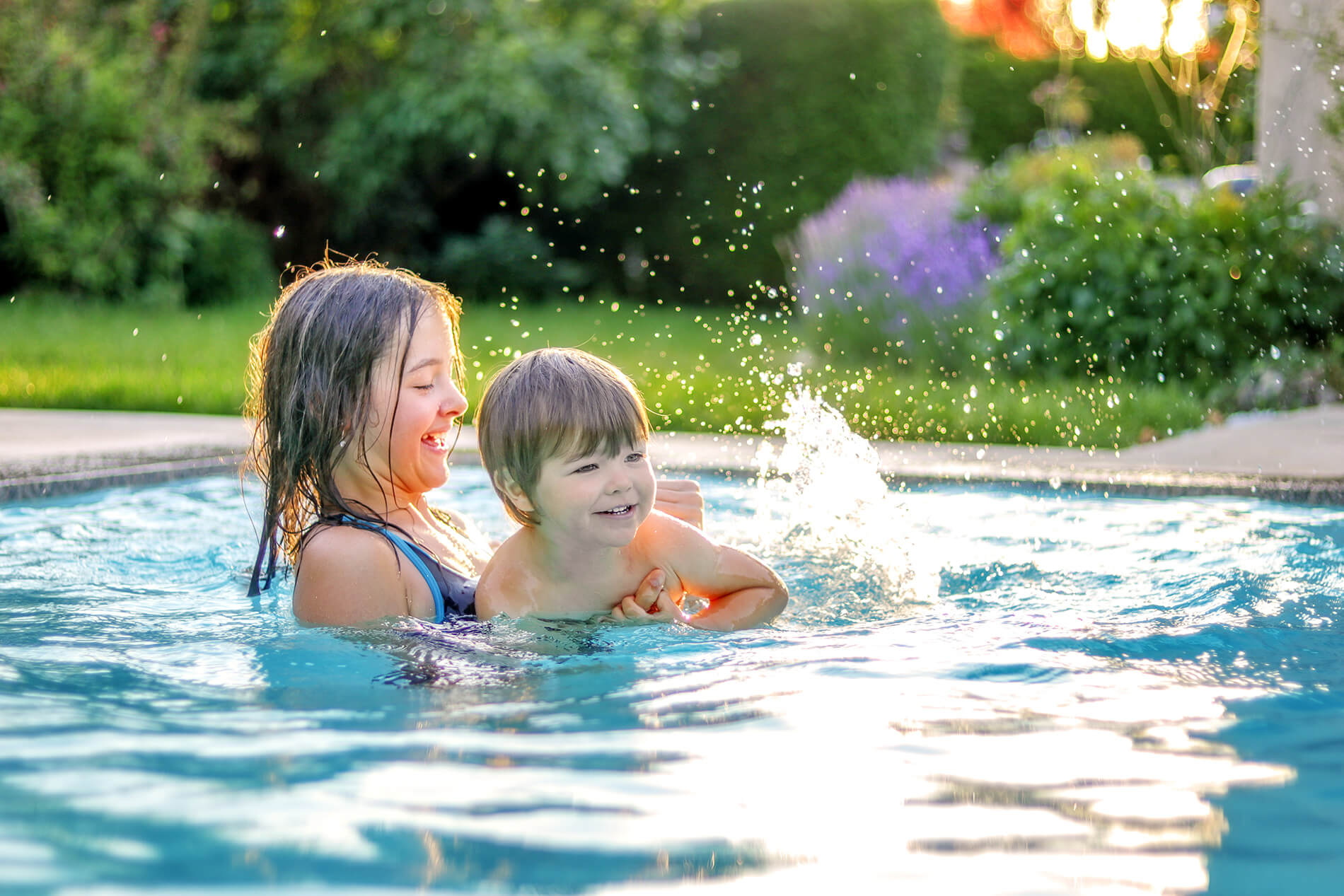 Kids swimming in the pool