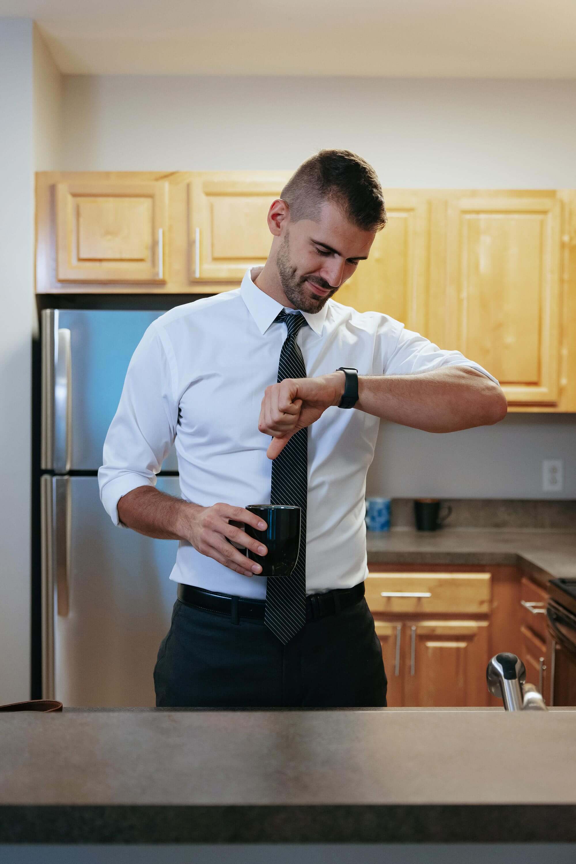 Union Place man with coffee in kitchen