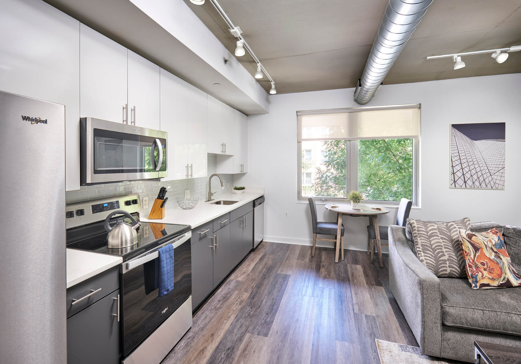 View 14 staged kitchen and dining room