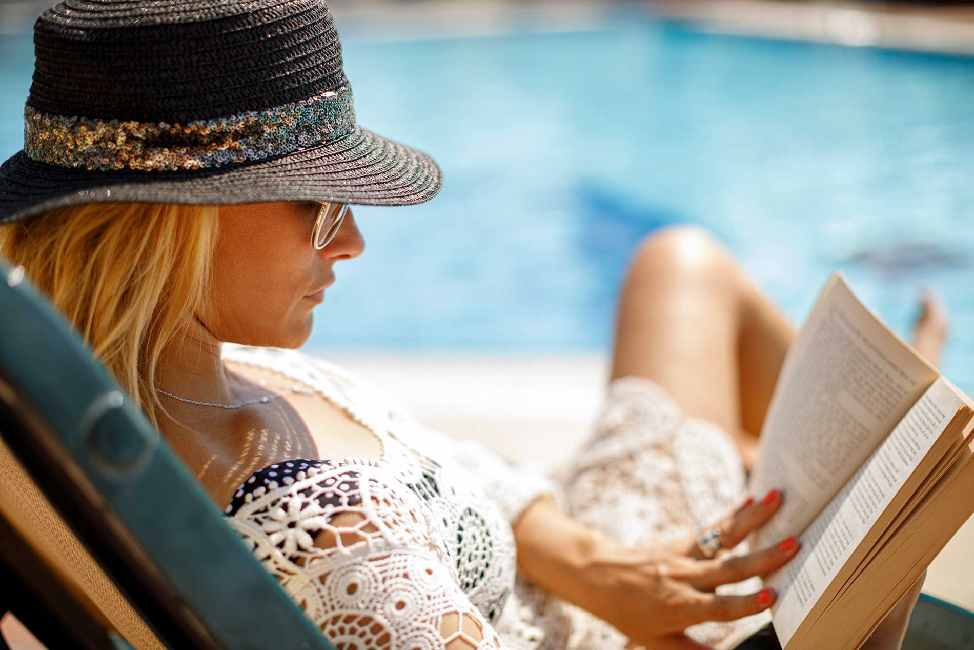 Woman Reading Poolside