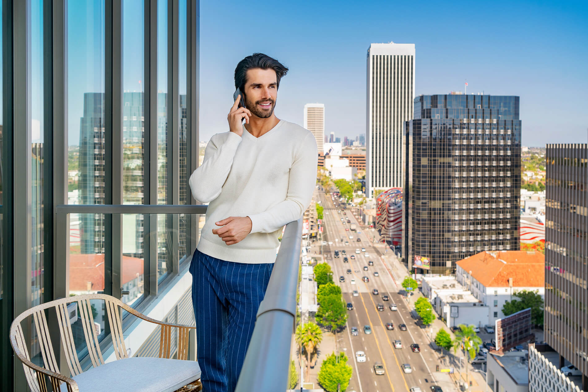 Man standing on balcony