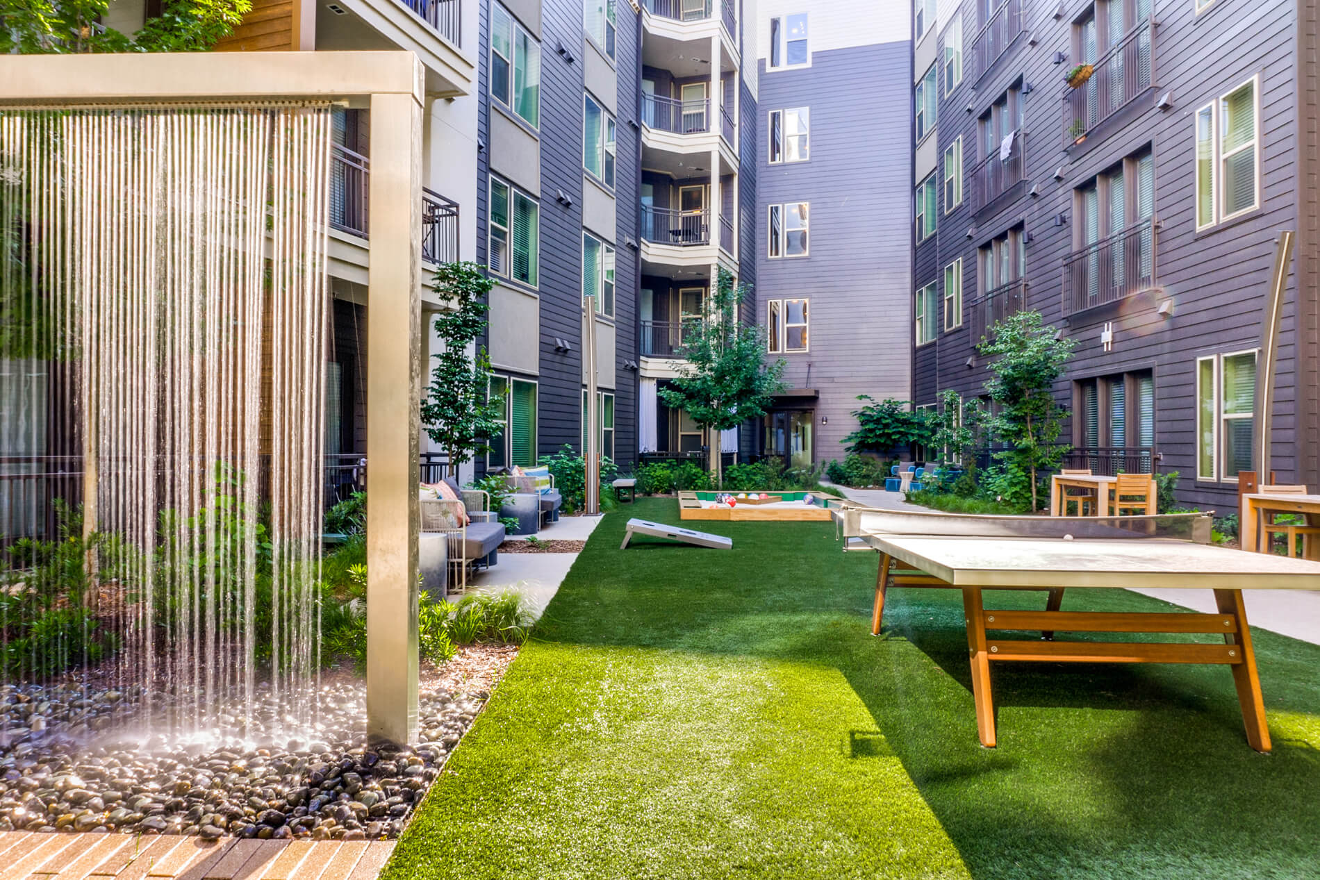 Vitruvian West courtyard with yard games