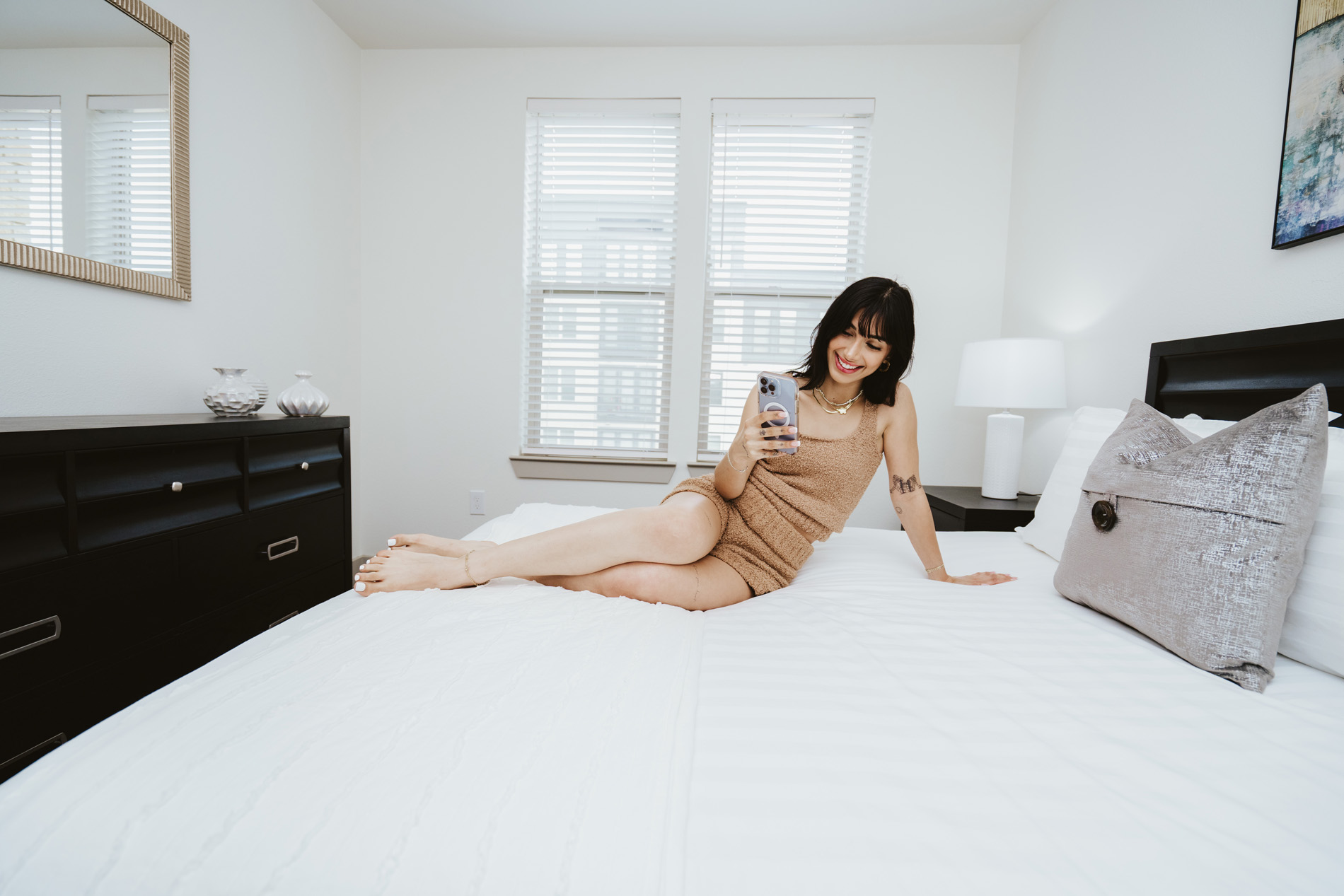 Vitruvian West woman in bedroom