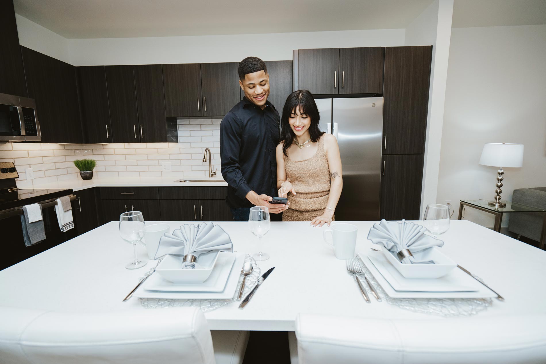 Vitruvian West man and woman in kitchen