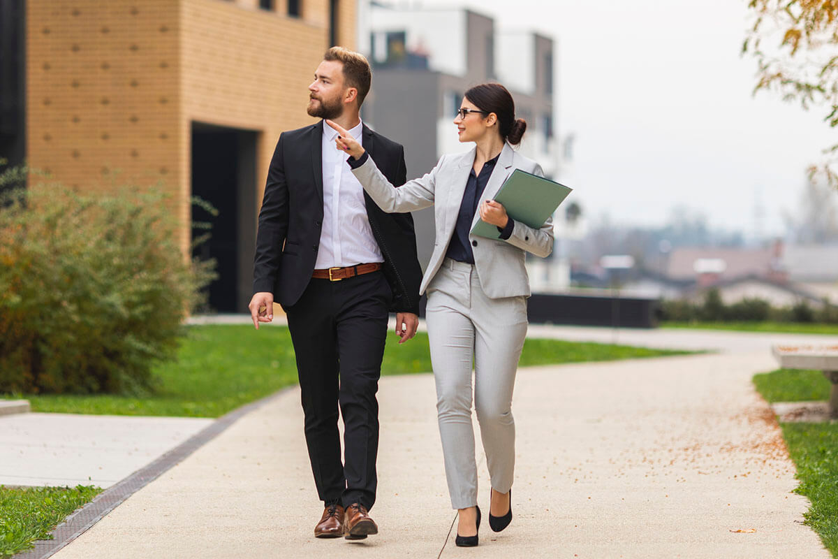 property manager woman touring man