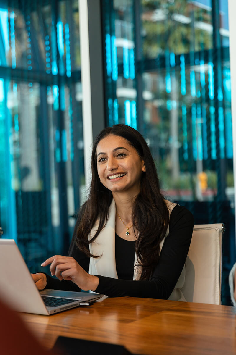 girl smiling working at computer