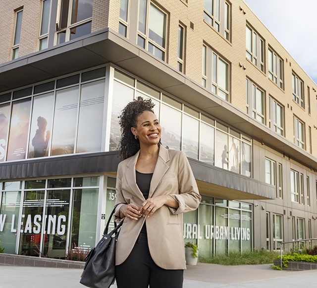 Woman touring apartment community