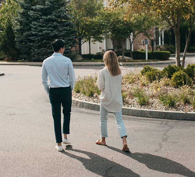 Man and woman touring apartment