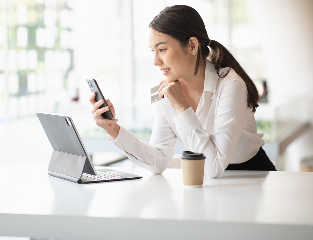 woman on tablet and phone