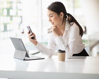 woman on tablet and phone