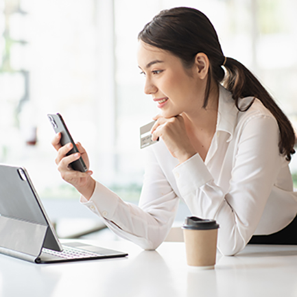 woman on tablet and phone