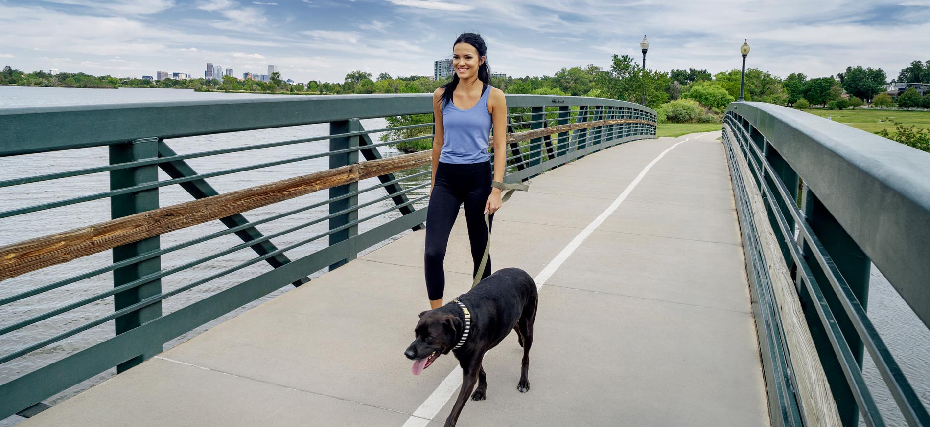 woman walking dog at Sloan's lake