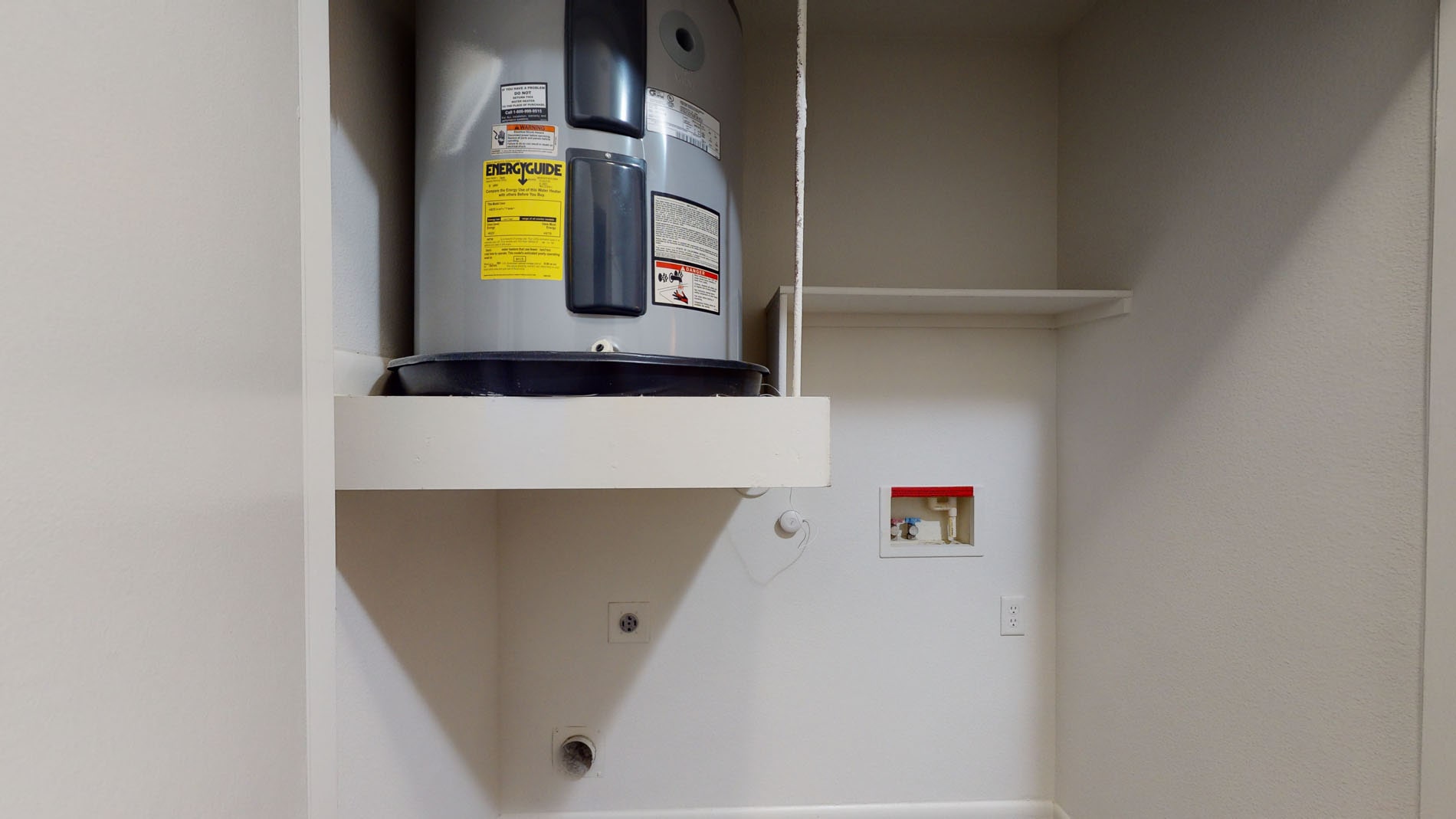 Laundry room at Legacy Village Apartment Homes